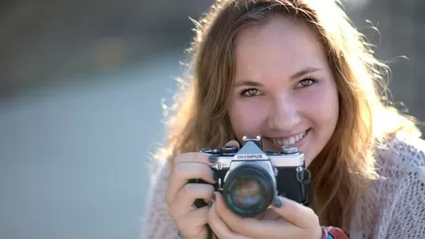 You'll learn how to take better portraits with any camera in this complete portrait photography course.