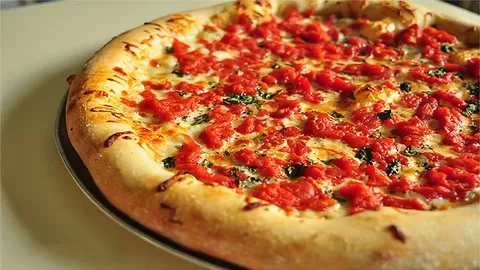 You can bake Pizzeria Style Pizza in your Home Oven! Learn about pizza dough & recipes for many regional styles of pizza
