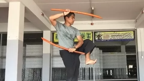 Swords swing best control in tradition of Thailand Krabi Krabong fighting action warfare and meditation with sword tips